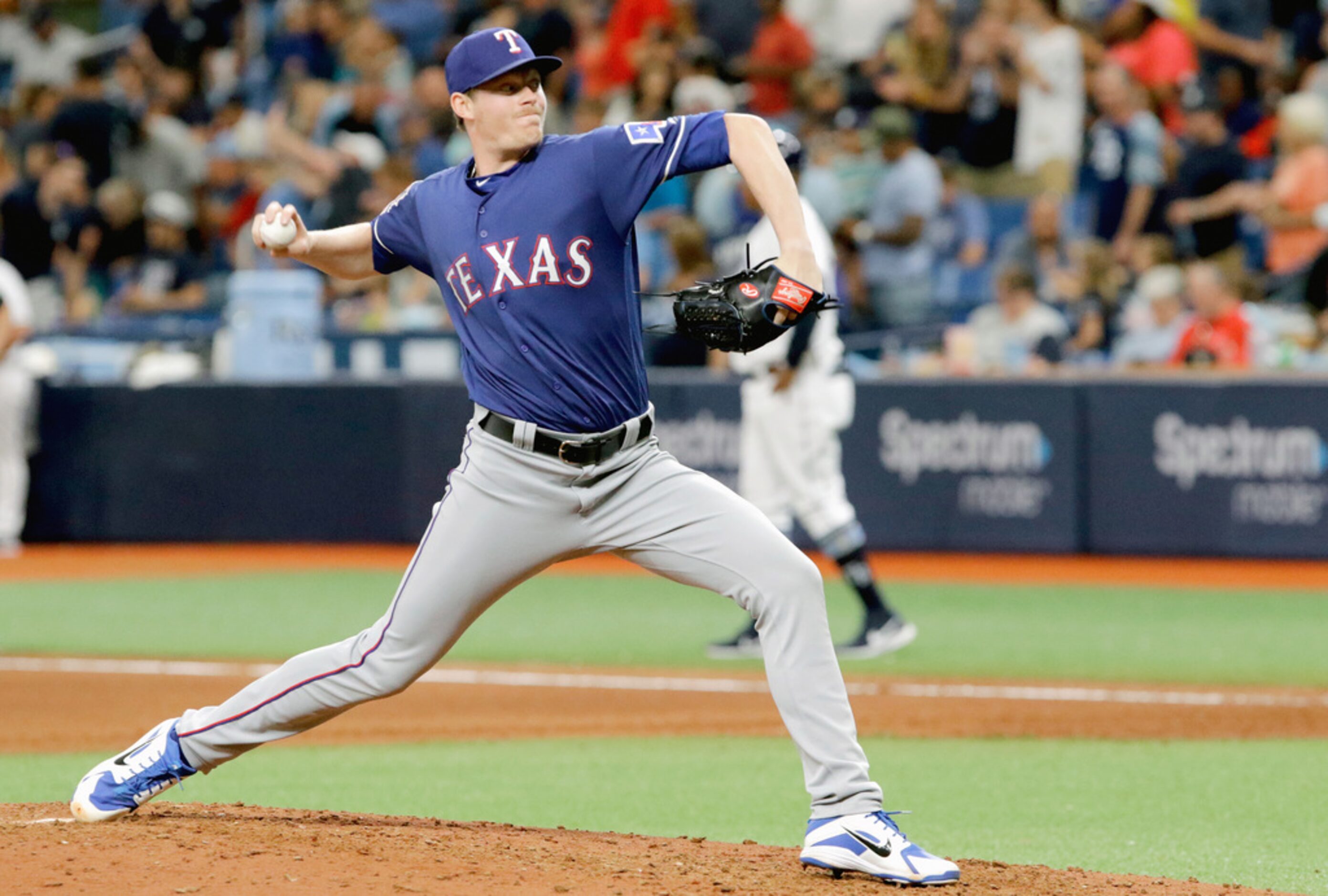 ST. PETERSBURG, FL - JUNE 29: Peter Fairbanks #46 of the Texas Rangers delivers a pitch...