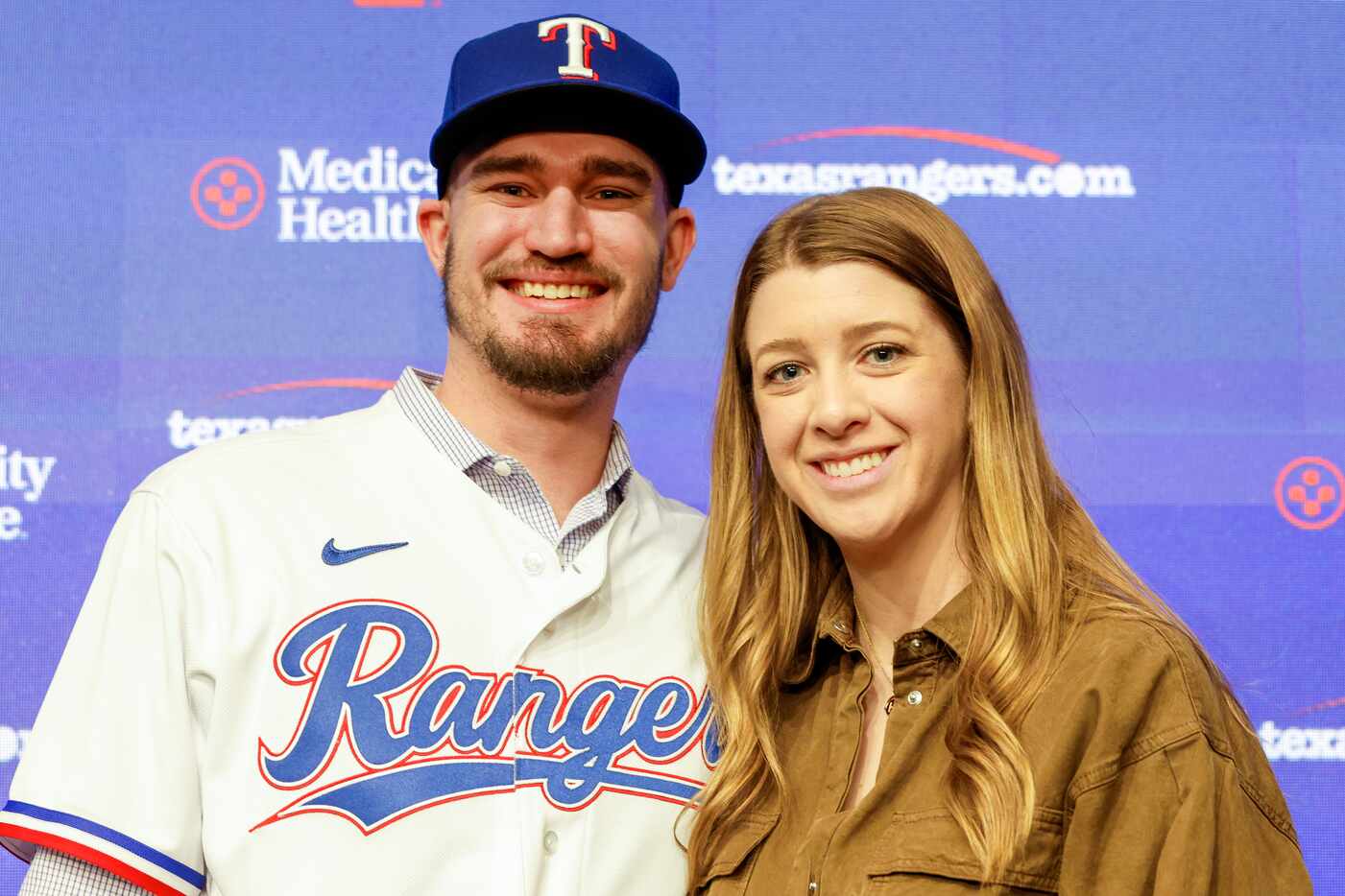 New Texas Rangers pitcher Andrew Heaney (left) poses with wife Jordan Heaney at Globe Life...