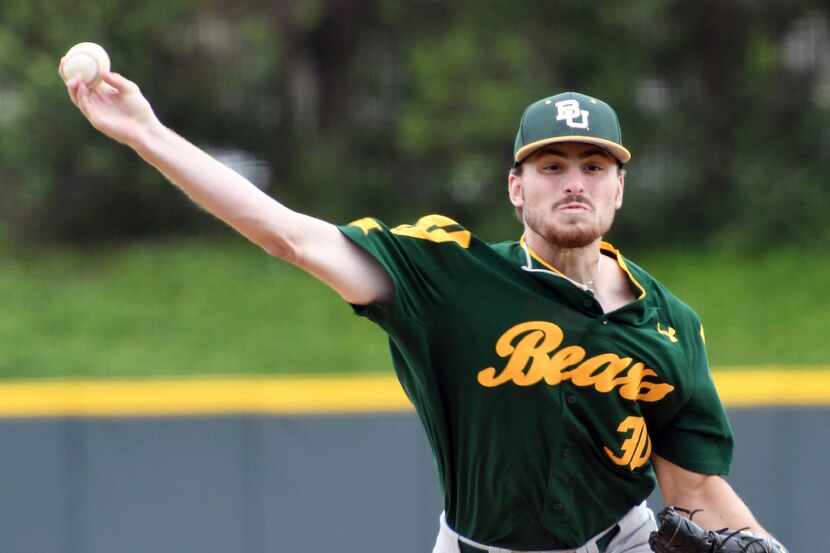 Baylor pitcher Montana Parsons throws against TCU in the first inning of an NCAA college...