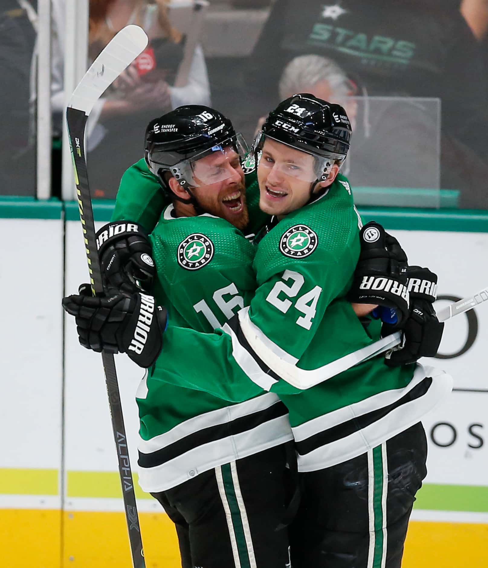 Dallas Stars forward Joe Pavelski (16) is congratulated by forward Roope Hintz (24) after...