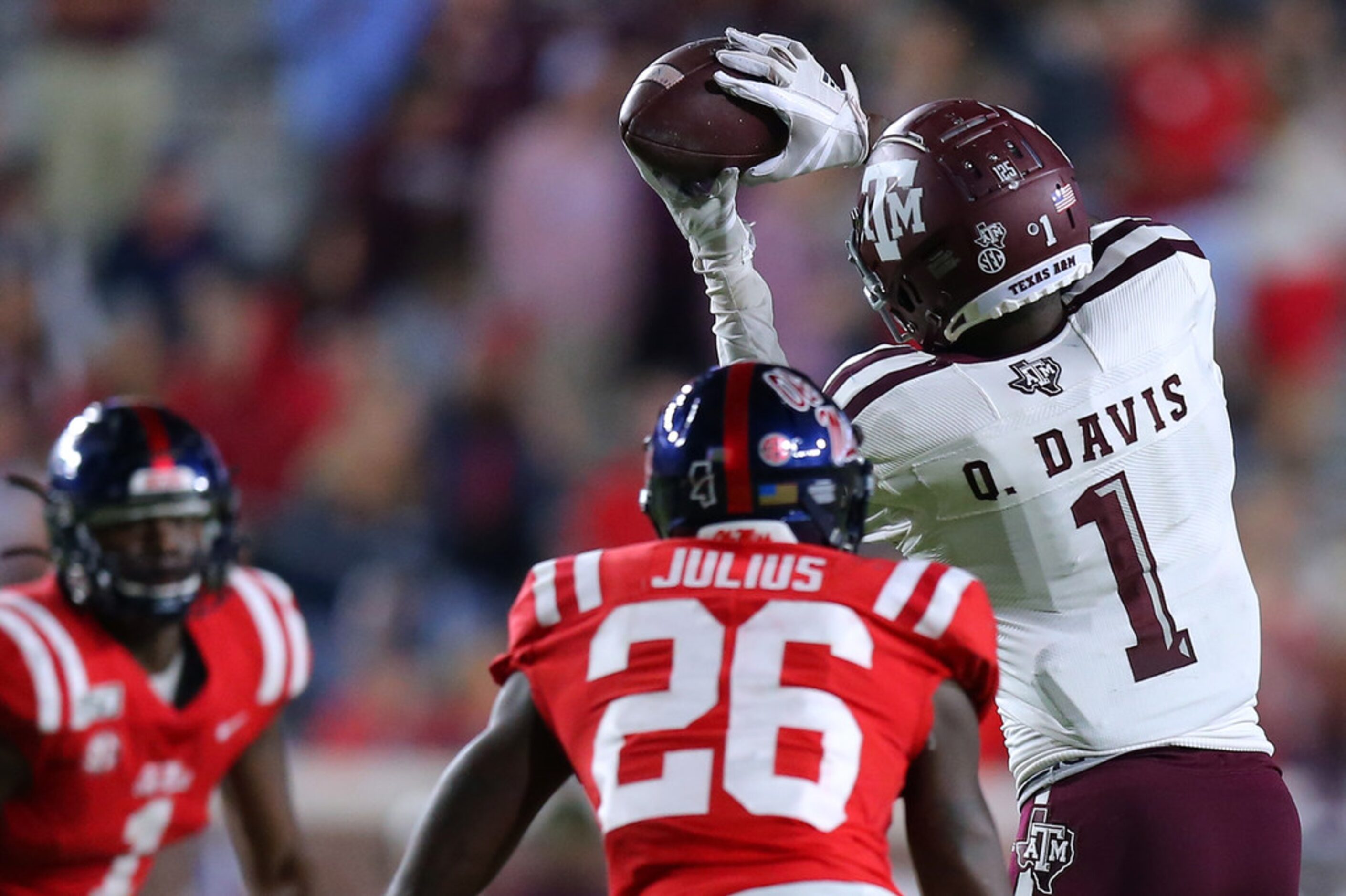 OXFORD, MISSISSIPPI - OCTOBER 19: Quartney Davis #1 of the Texas A&M Aggies catches the ball...