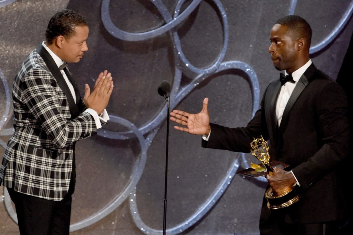 Actor Sterling K. Brown (R) accepts Outstanding Supporting Actor in a Limited Series or...