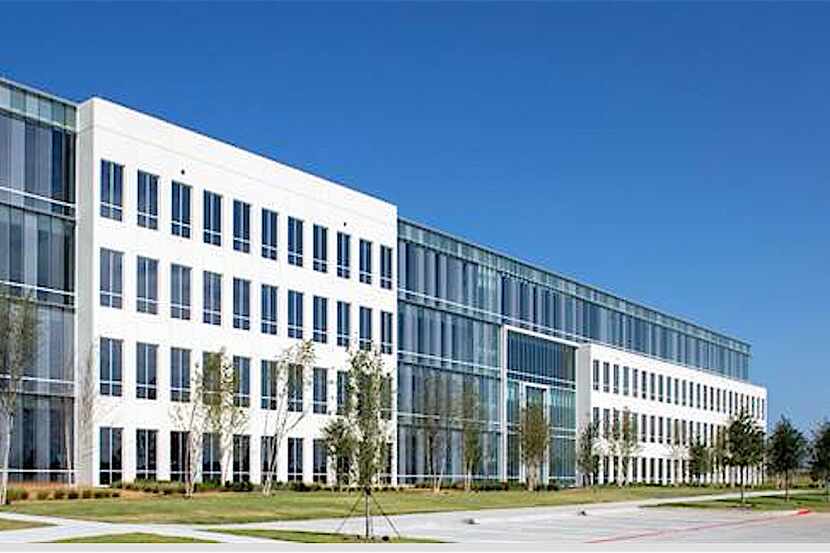 The new office building is near the northwest corner of the Dallas North Tollway and Bush...