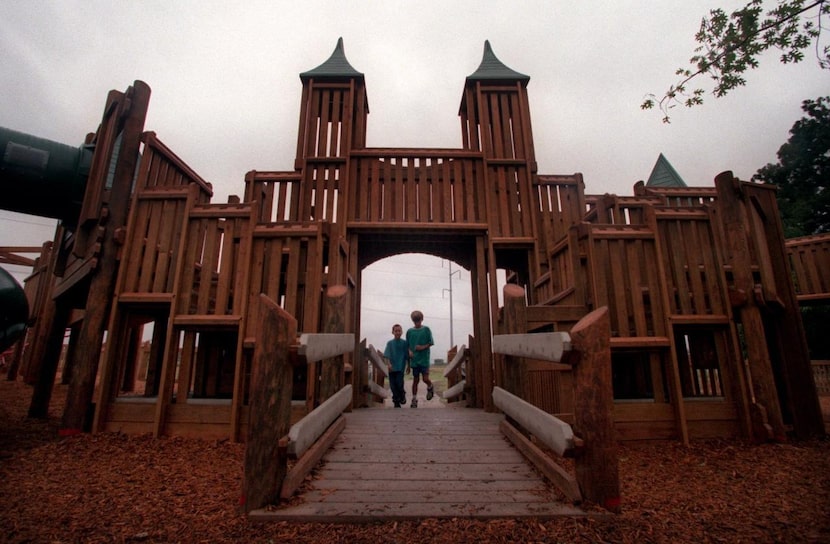 
Jacob Alexander (left), 6, and James Brandenburg, 8, arrive to play at Kids Kingdom, a...