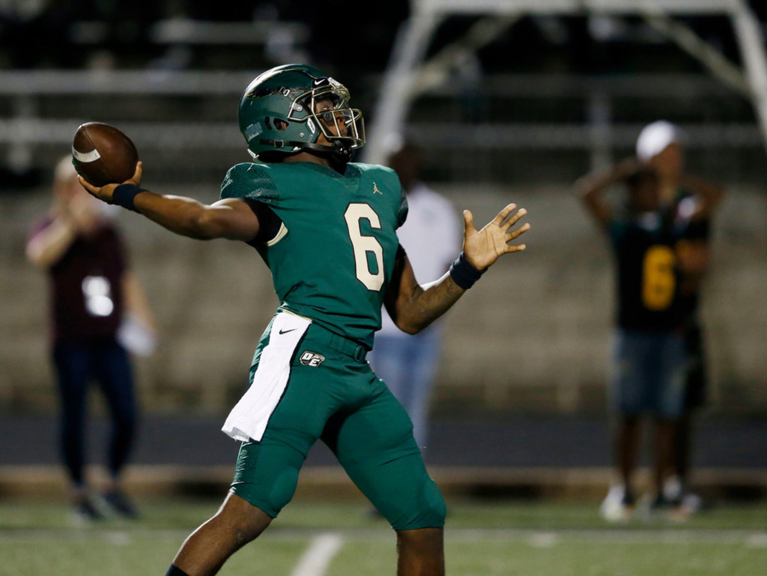 DeSoto's Samari Collier (6) attempts a pass in a game against Mansfield Lake Ridge during...