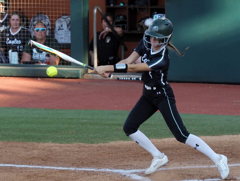 Mansfield Lake Ridge batter Tia Warsop hits the ball against Deer Park in the Class 6A...