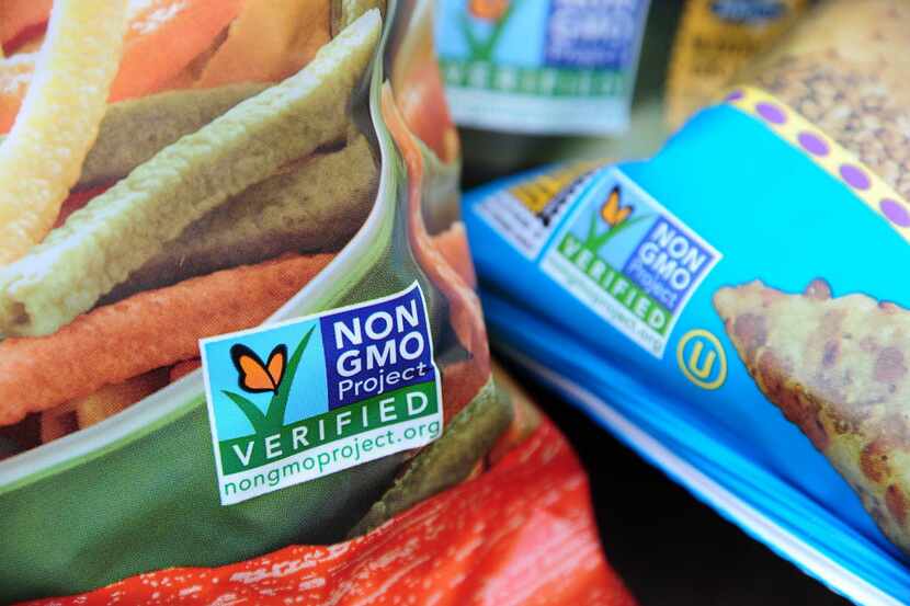 Labels on snack food bags in 2012 indicate they are non-GMO (genetically modified organism)...
