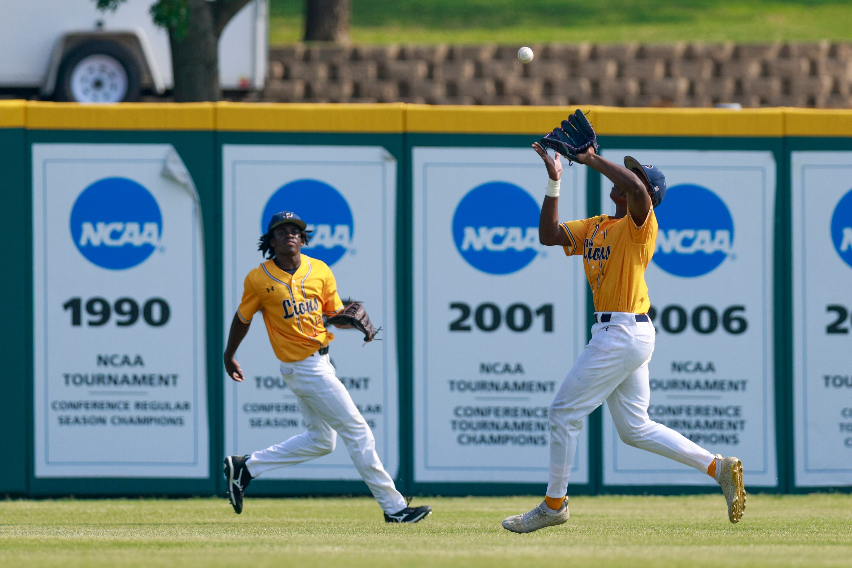 Plano Prestonwood centerfielder Tarris Murray (4) catches a fly ball for an out during a...