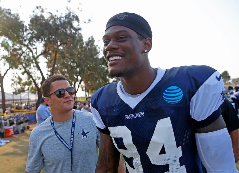 Dallas Cowboys defensive end Randy Gregory walks off the field after the afternoon practice...