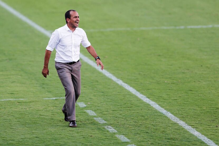 FC Dallas head coach Oscar Pareja on the sideline during the first half of an MLS game...
