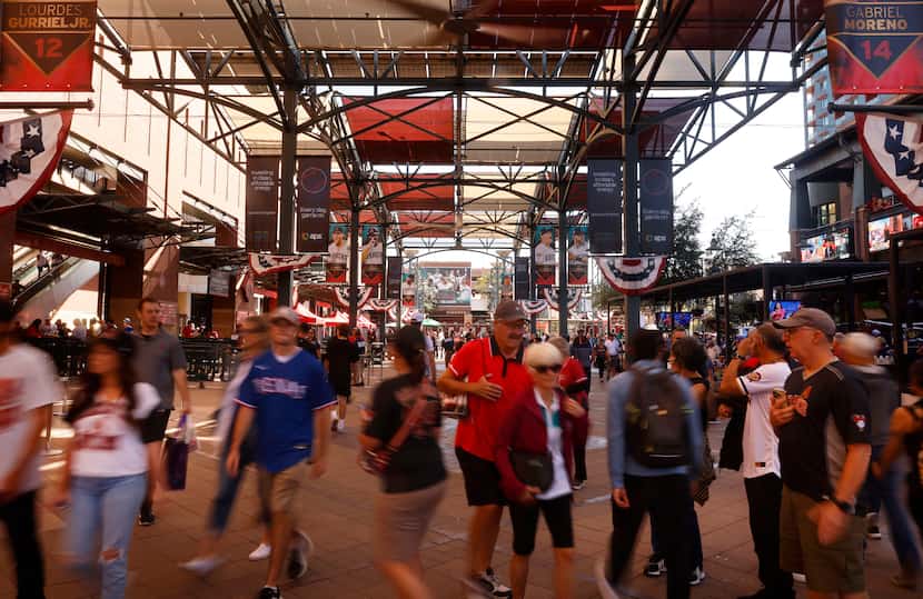 Texas Rangers and Arizona Diamondbacks fans file into Chase Field for Game 3 of the World...