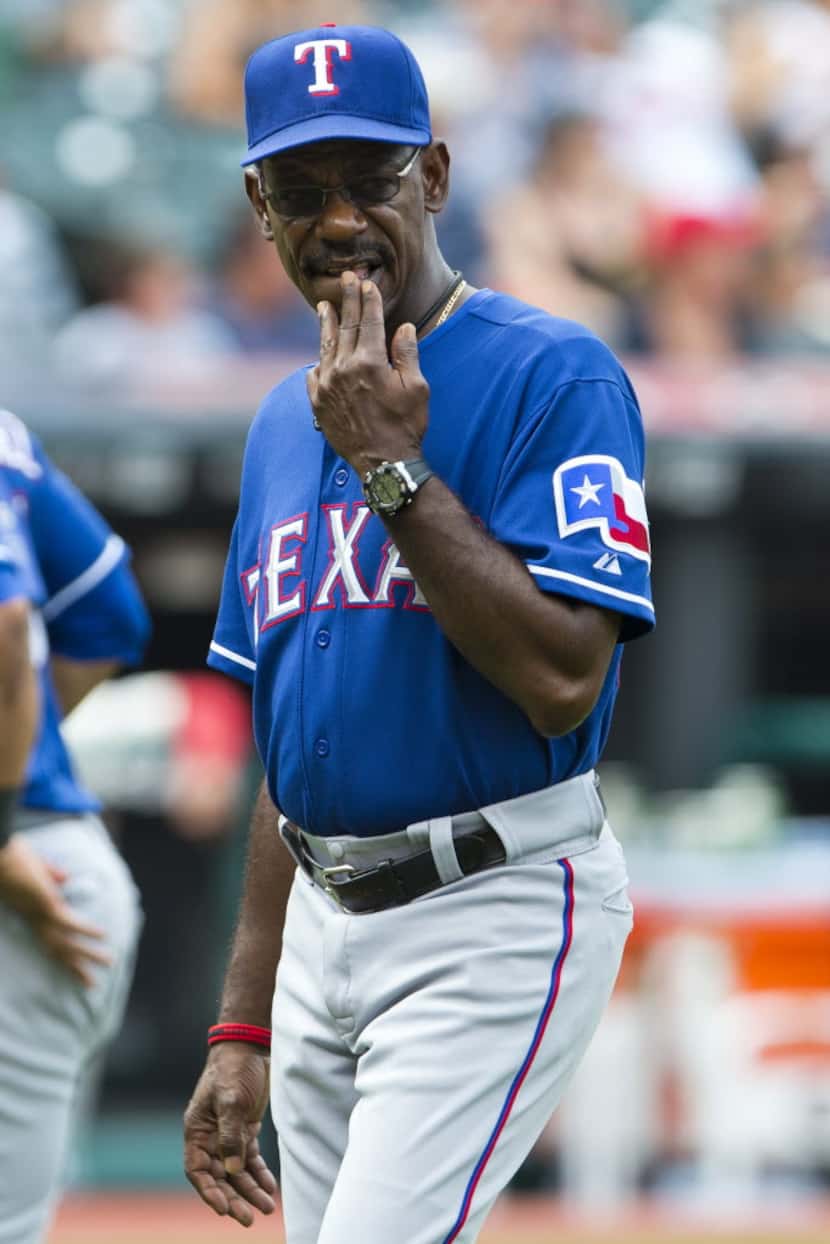 CLEVELAND, OH - SEPTEMBER 02: Manager Ron Washington #38 of the Texas Rangers walks back to...