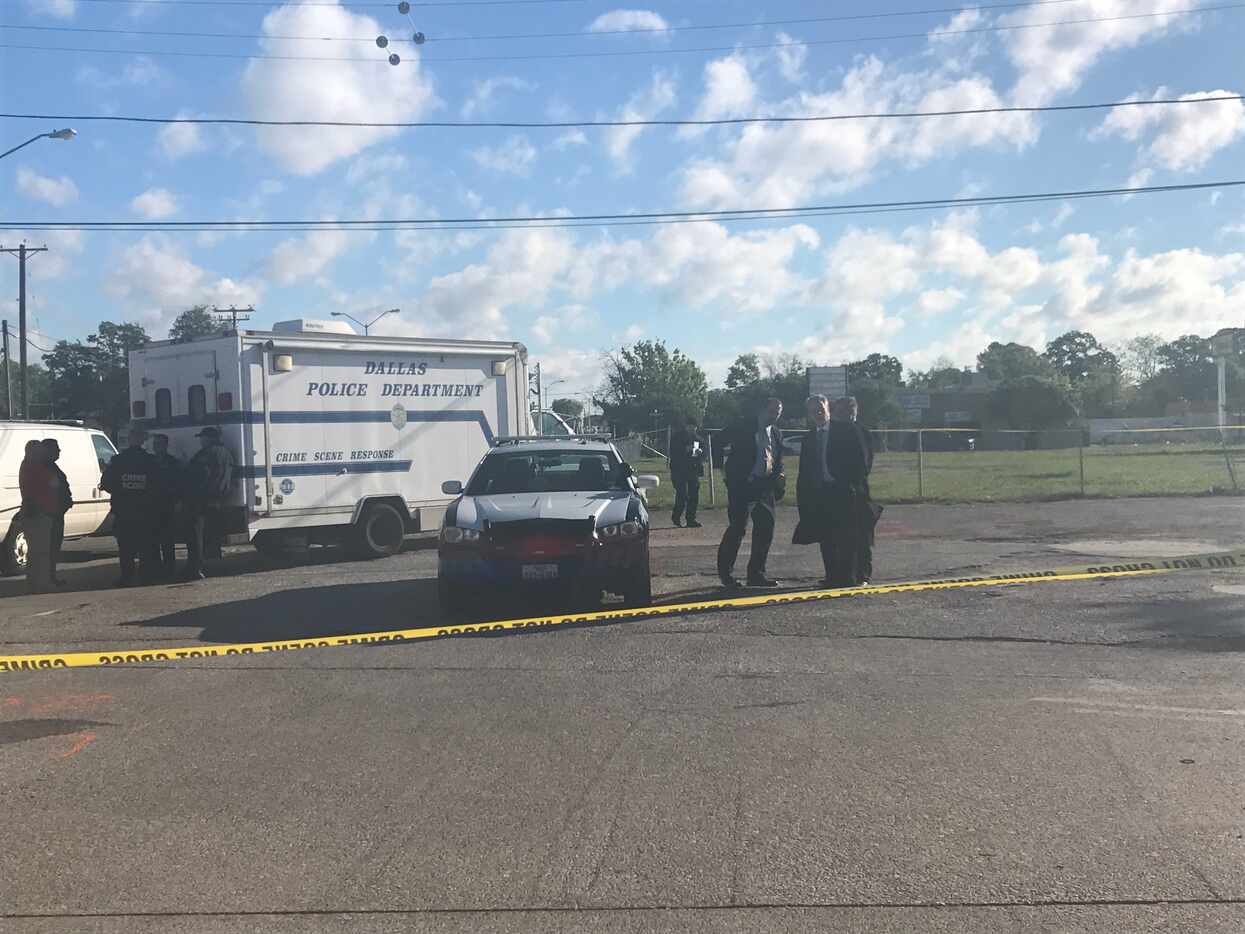 Police investigated the scene Wednesday morning after an officer shot a knife-wielding woman...