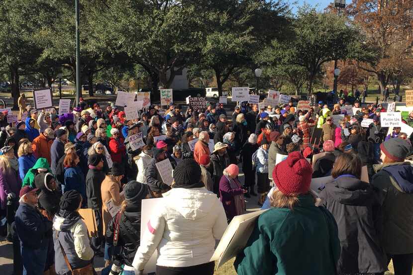 Protestors gathered at the state Capitol on Monday calling on the state's electors to vote...
