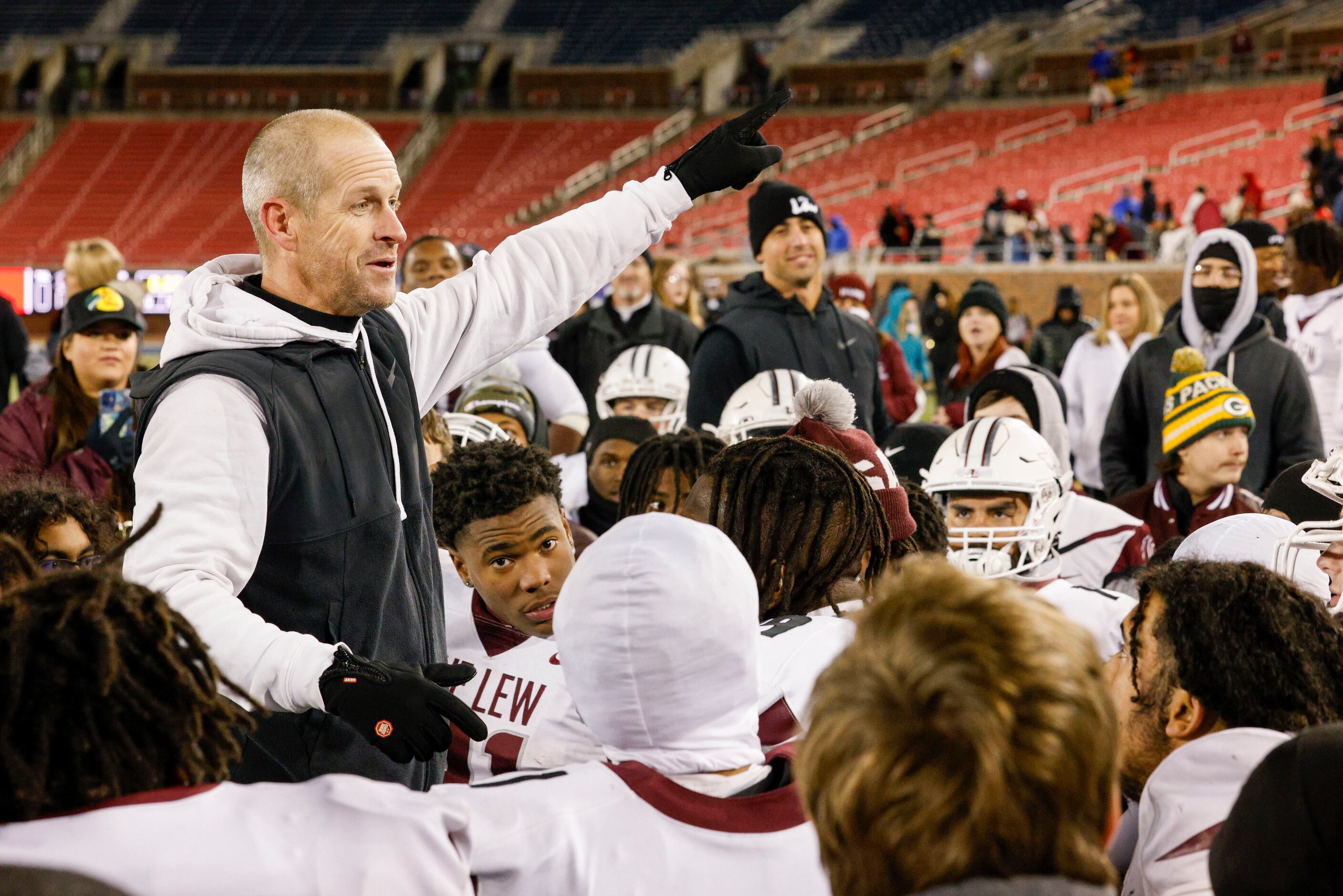 Lewisville head coach Michael Odle talks to his team after  a Class 6A Division I area-round...