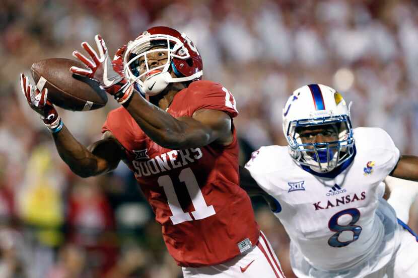 FILE - In this Oct. 29, 2016, file photo, Oklahoma wide receiver Dede Westbrook (11) makes a...