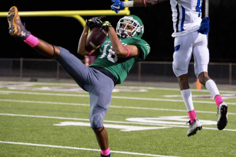 Bryan Adams senior defensive back Antoine Barnes (16) interprets a pass intended for...