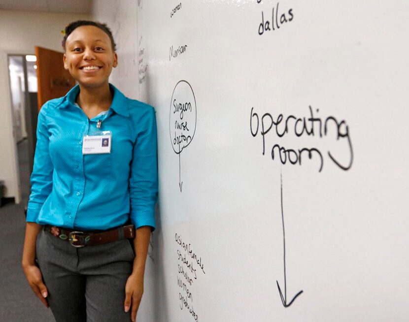 
Kadrian Oliver, a 17-year-old communications, marketing and public affairs intern at UT...