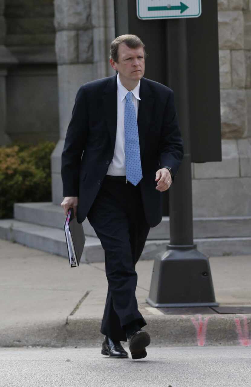 Jeff Mateer, first assistant to attorney general, enters the courtroom where the federal...