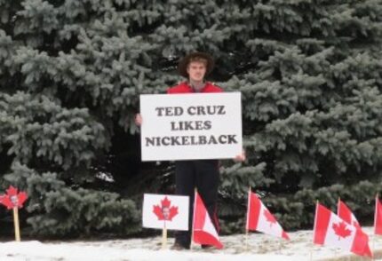  A protester dressed as a Canadian Mountie accusing Sen. Ted Cruz of liking Nickelback, an...