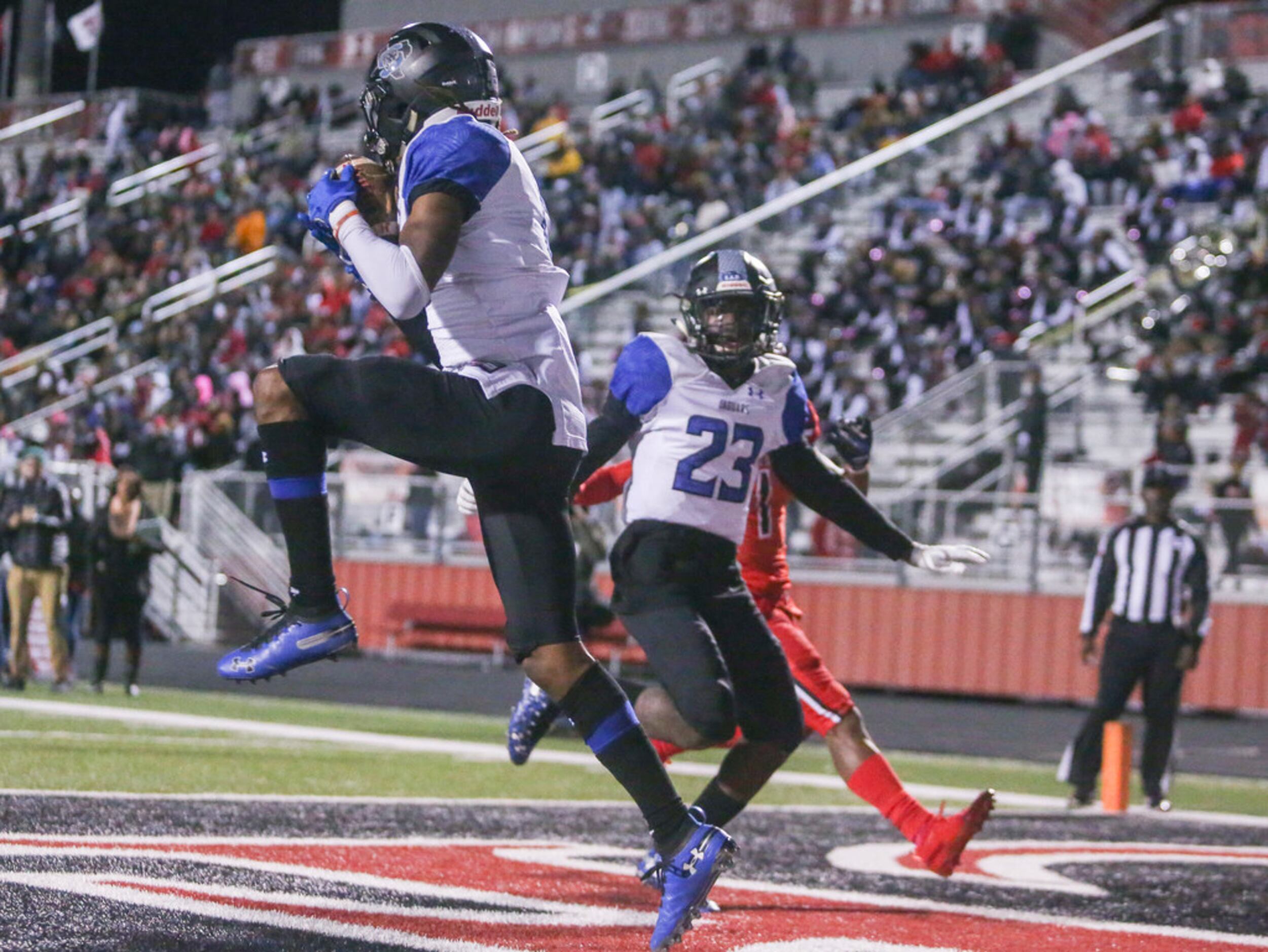 Mansfield Summit defensive back Sean Smith (5) intercepts a pass intended for Cedar Hill...