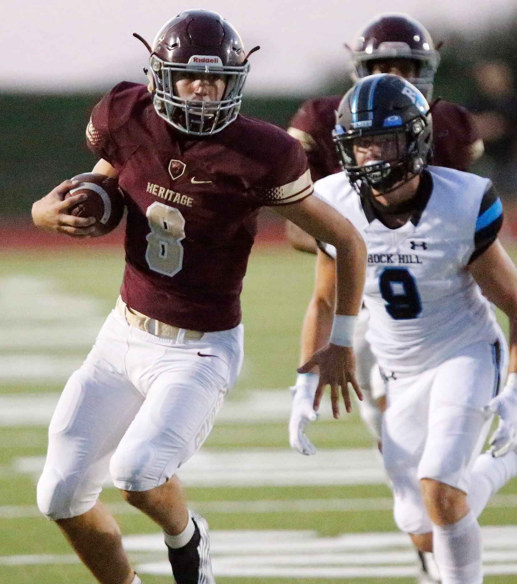 Heritage High School Bryce Gilchrist (8) runs after a catch during the first quarter as...