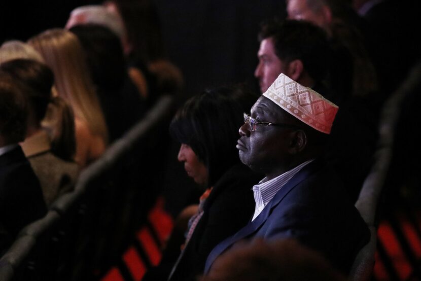 Malik Obama, President Barack Obama's Kenyan-born half brother, listens to the candidates....