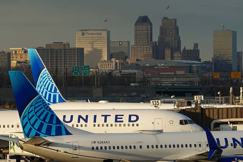 United Airlines planes are seen at the gates of Newark International Airport as the Newark...
