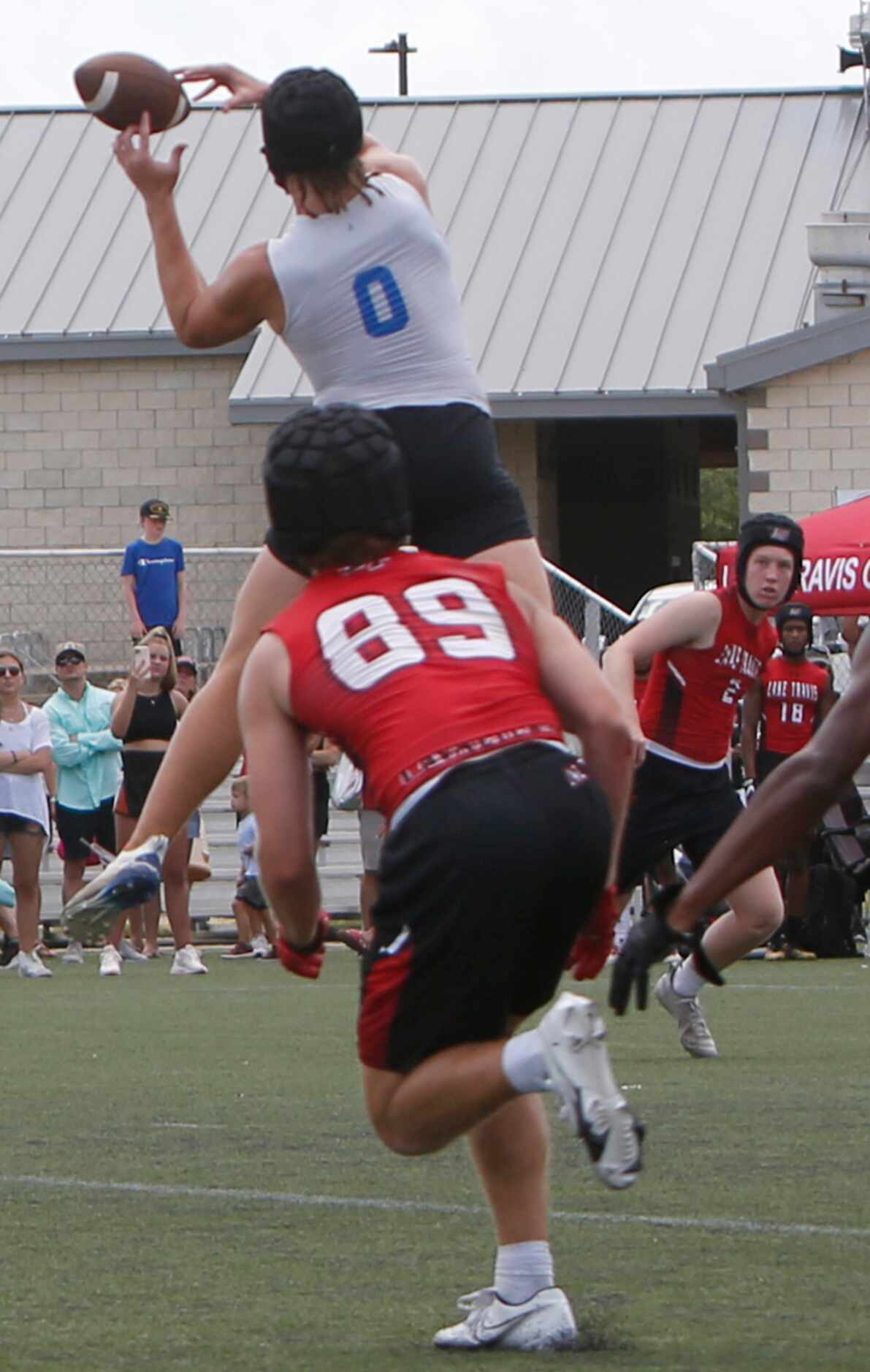 Hebron linebacker Brock Carter (0) leaps to successfully defend a pass intended for a Lake...