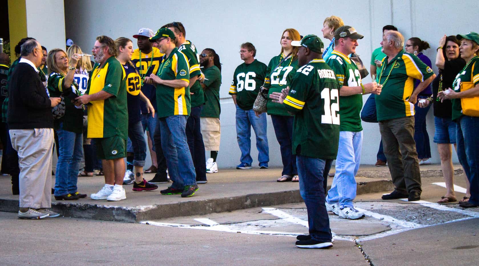 Green Bay Packers fans stretch their legs during halftime at Vernon's Gastropub in Addison.