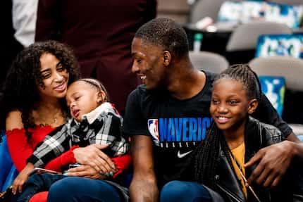 Mavericks forward Dorian Finney-Smith with his girlfriend Jazmyne Branch and his children...