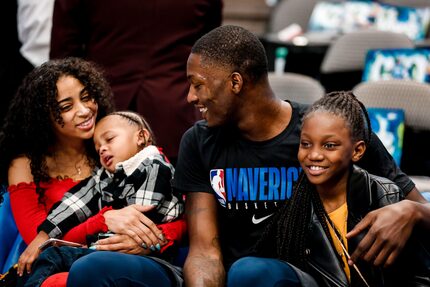 Mavericks forward Dorian Finney-Smith with his girlfriend Jazmyne Branch and his children...