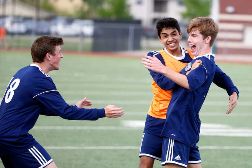 Flower Mound's Shane Popieluch (right), Aaditya Patil (center) and Nate Mulkey, pictured in...