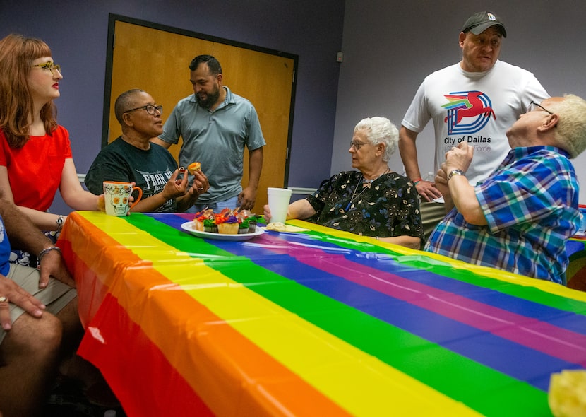 Silver Pride Project coordinator Portia Cantrell (second from left) chatted with park board...