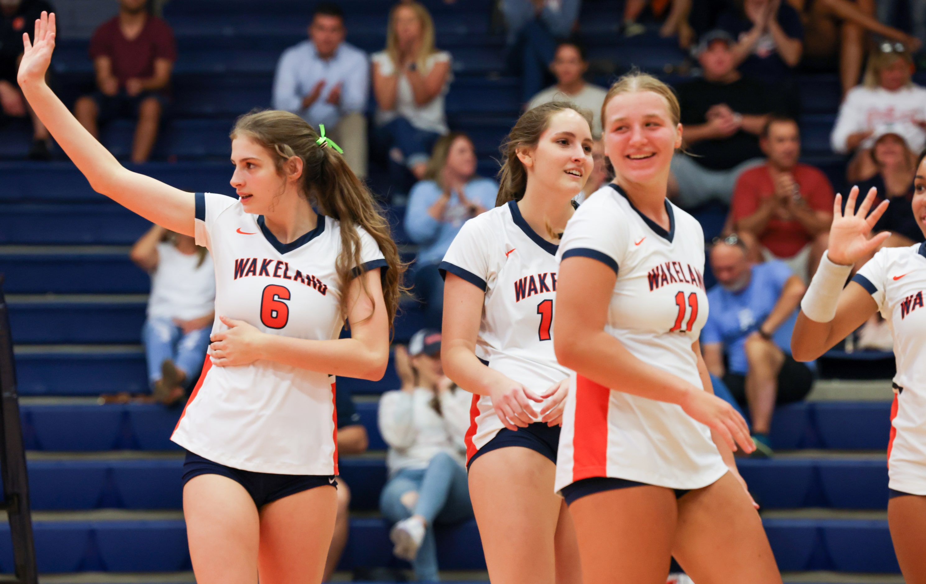 Frisco ISD’s Wakeland High School Hannah Lee (6) waves goodbye to FISD Memorial High School...