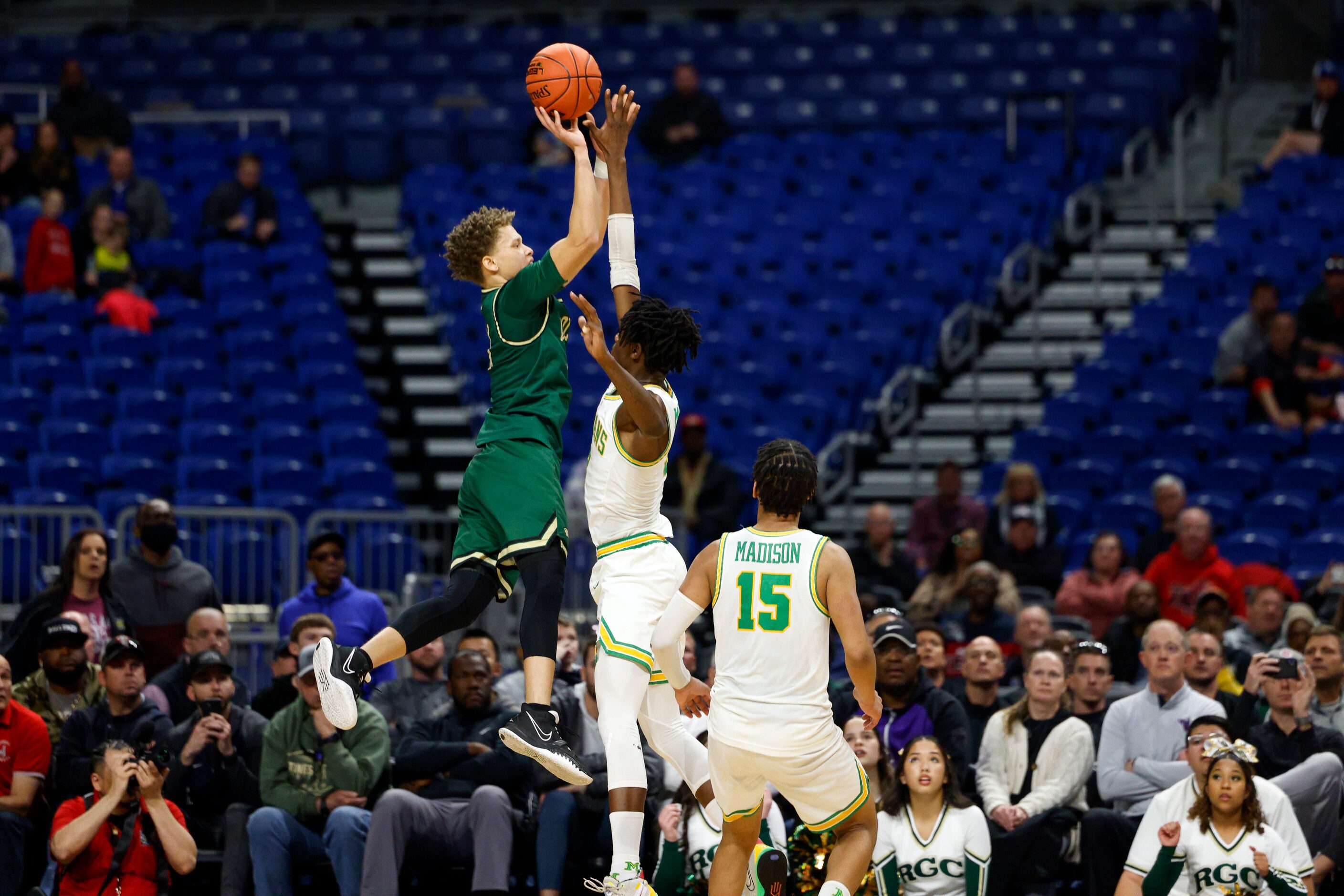 San Antonio Cole guard Trey Blackmore (11) attempts a three-point shot as time expires over...