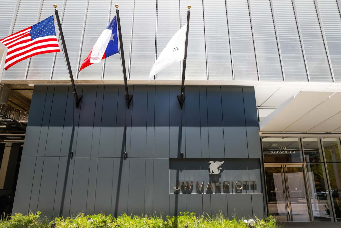 Flags wave from the outside of the new JW Marriott Dallas Arts District in downtown Dallas.