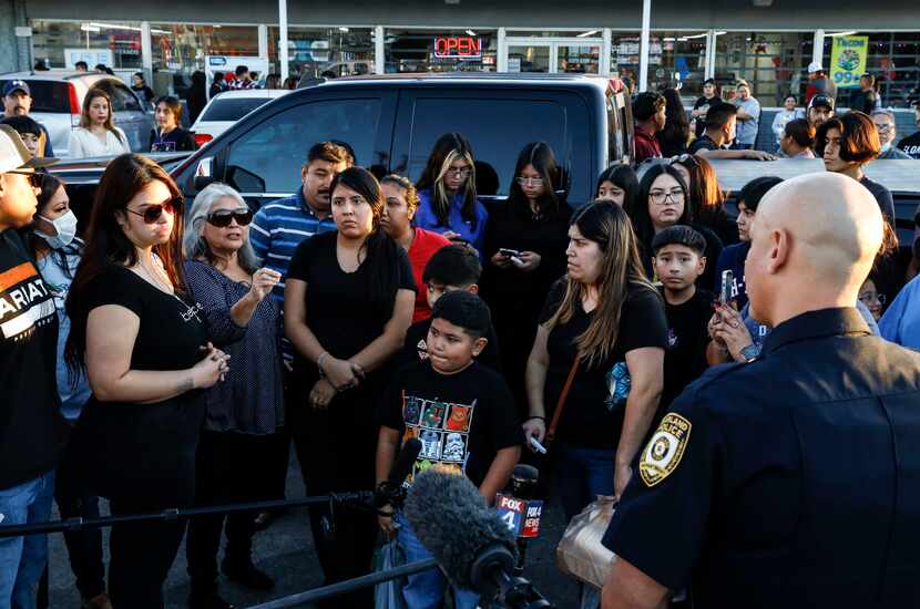 During Tuesday's vigil at the Texaco station, Garland police Lt. Pedro Barineau, a...