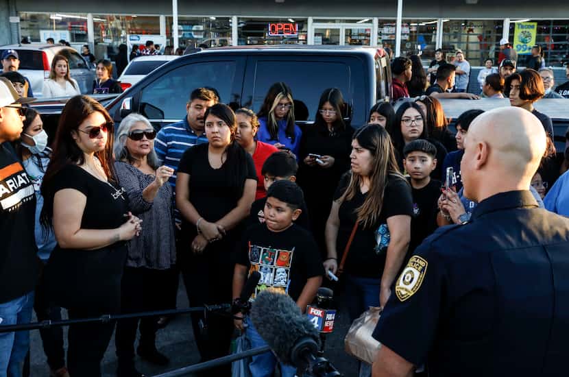 During Tuesday's vigil at the Texaco station, Garland police Lt. Pedro Barineau, a...