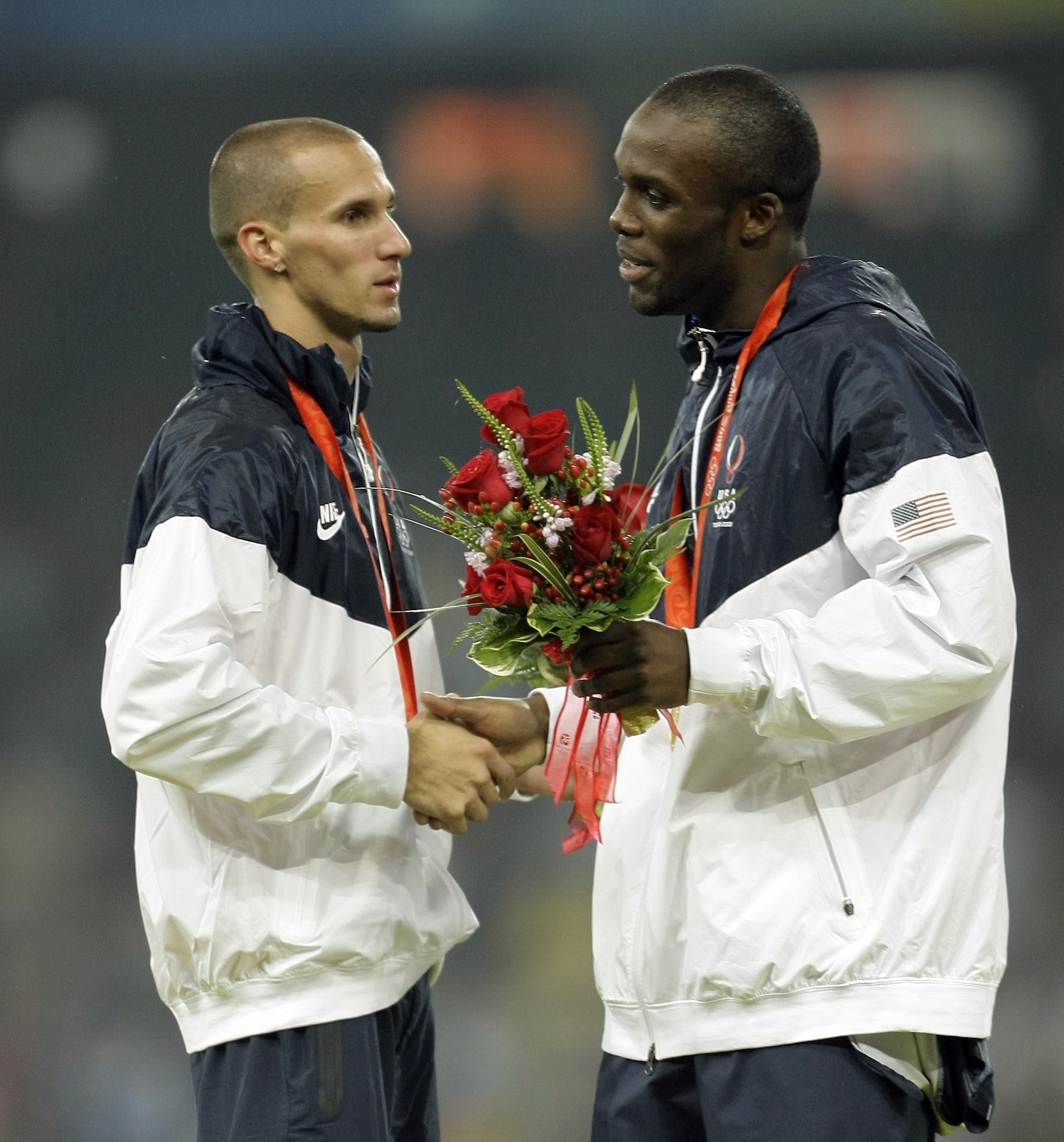 2008 Beijing Olympics: Silver medalist Jeremy Wariner,left, congratulates gold medal winner...