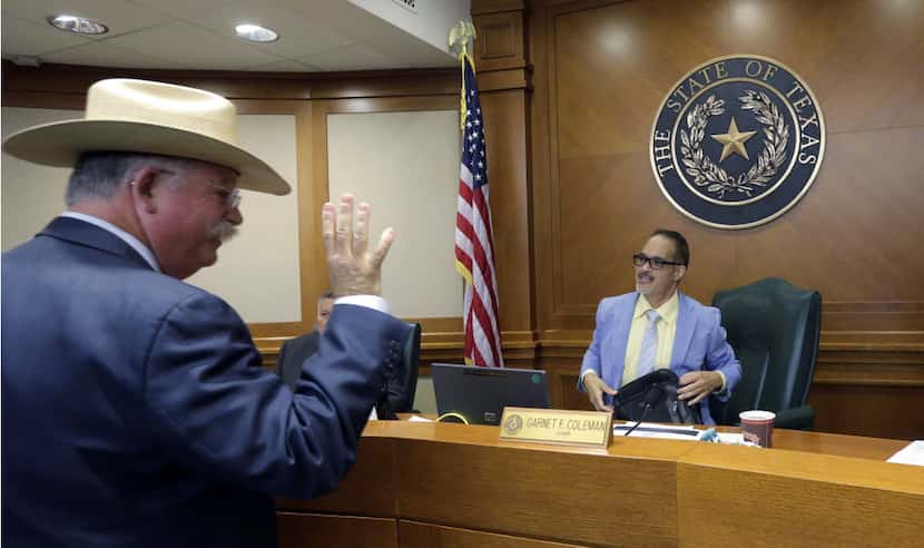  Victoria County Sheriff T. Michael O'Connor, left, greets Texas County Affairs Committee...