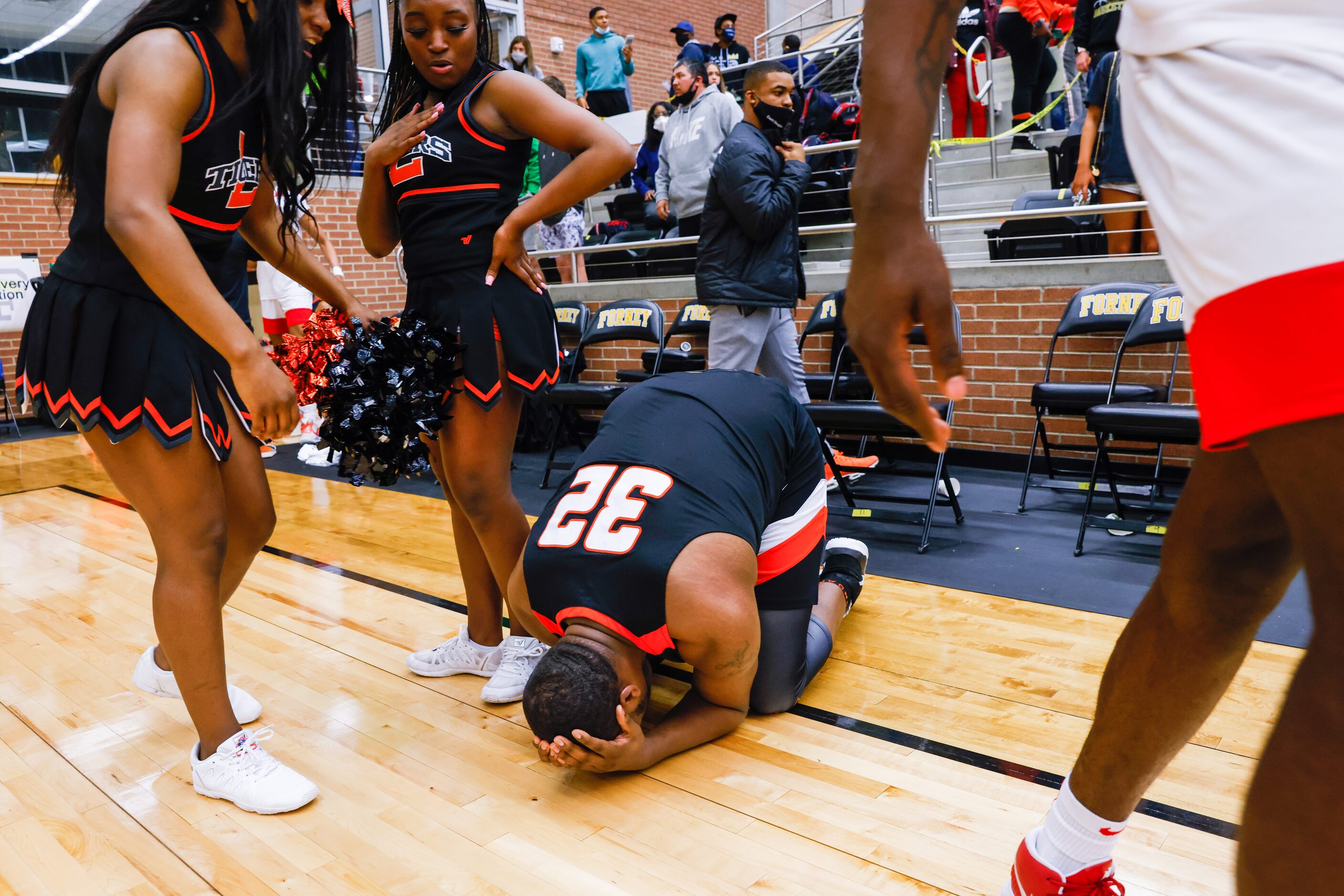 Lancaster's Damon Walker (32) falls to his knees after his team's loss to Kimball following...