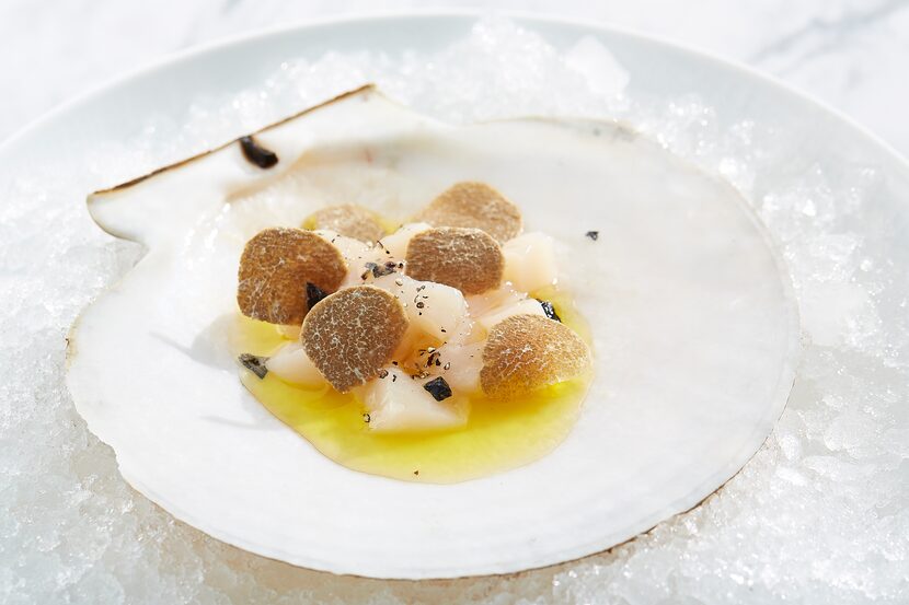 Live diver scallop, shallot brown butter, wild mushroom broth, shaved black truffle. The...