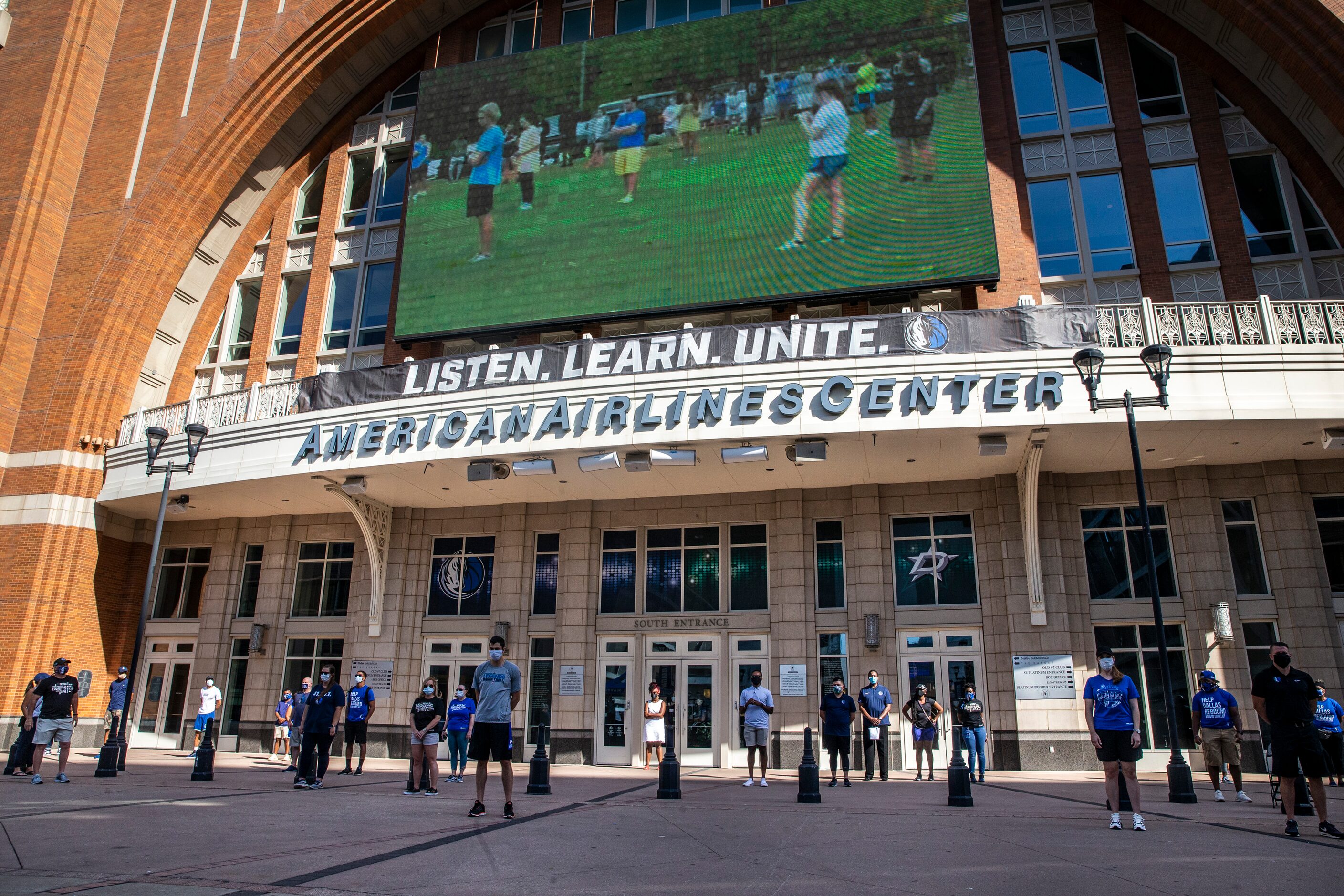 Attendees participate in the $100 race challenge to highlight how systemic racism impacts...