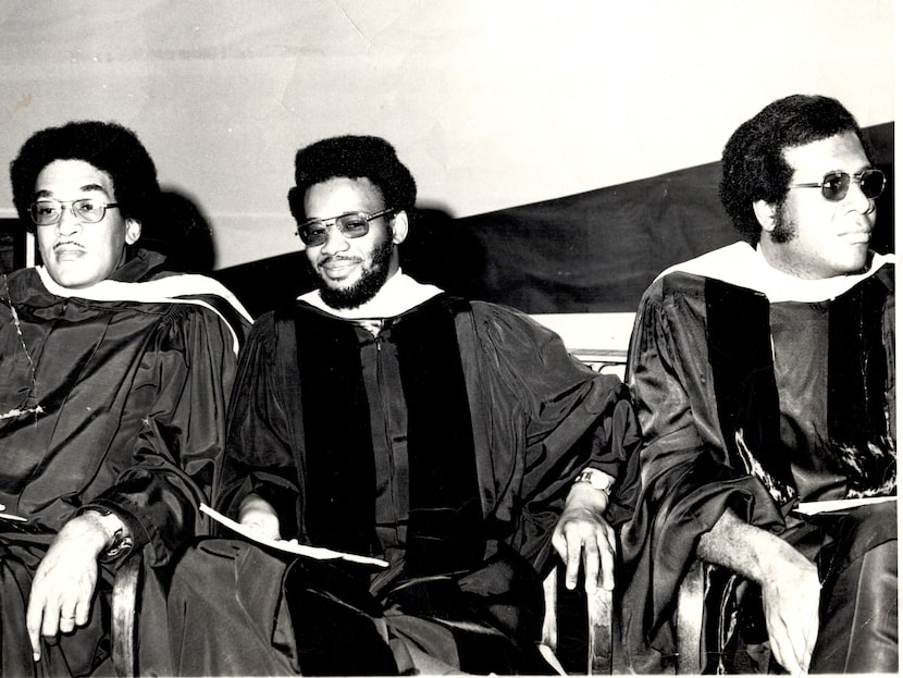 Harry Robinson Jr. (center) at a graduation for Bishop College.