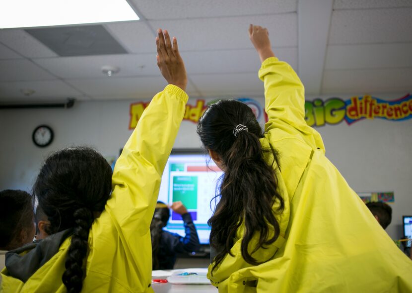 Students in a middle school classroom at the South Texas Family Residential Center that...