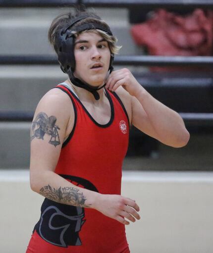 Transgender wrestler Mack Beggs of Euless Trinity High School is pictured at a dual meet at...