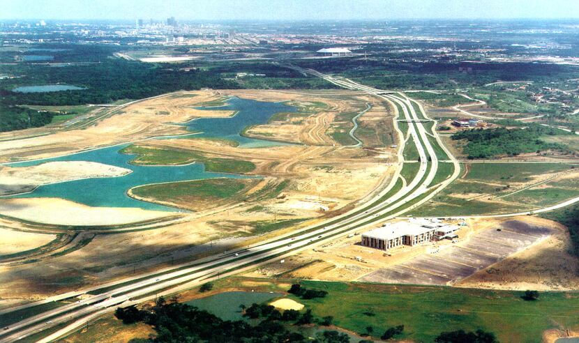 The Las Colinas Urban Center was still under construction on State Highway 114 in the late...