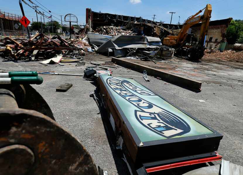 Demolition crews are razing the old El Corazon Mexican restaurant in the Bishop Arts area of...
