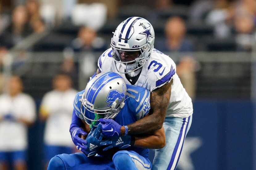Dallas Cowboys cornerback Anthony Brown (3) tackles Detroit Lions wide receiver Kalif...